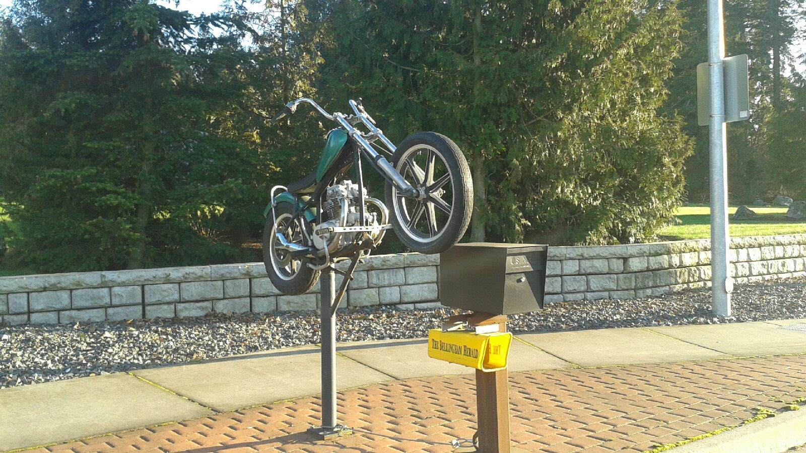 Cool Mail Boss Sighting - Motorcycle on a Mailbox!