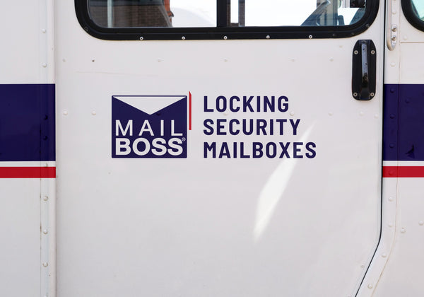 How does a mail carrier deliver to a locking mailbox?